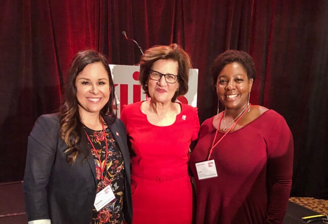 Mandy and Lori in a group photo at the Girls Inc. Conference