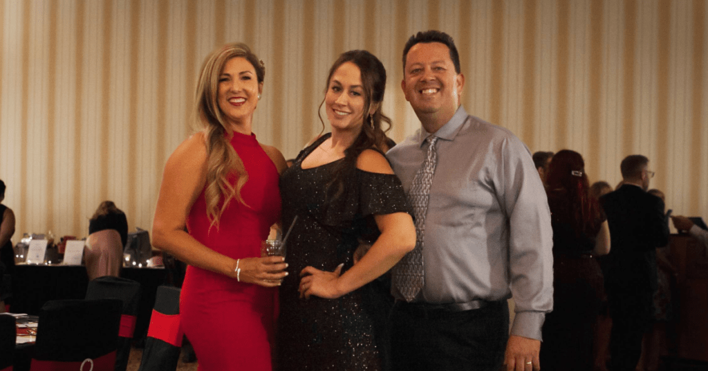Melanie Vincent, Sarah Wallace, and Joe Bull at the 2022 Girls Inc. Gala