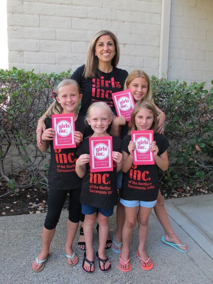 Former Executive Director, Kate O-Rorke, and four Girls Inc. participants