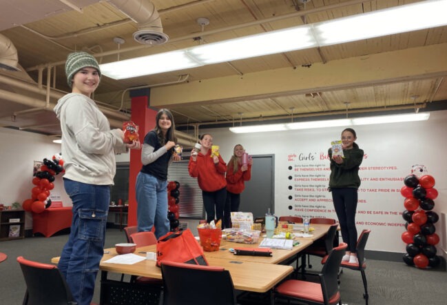 Youth Leadership Council participants during a fun group activity at the Girls Inc. NSV office